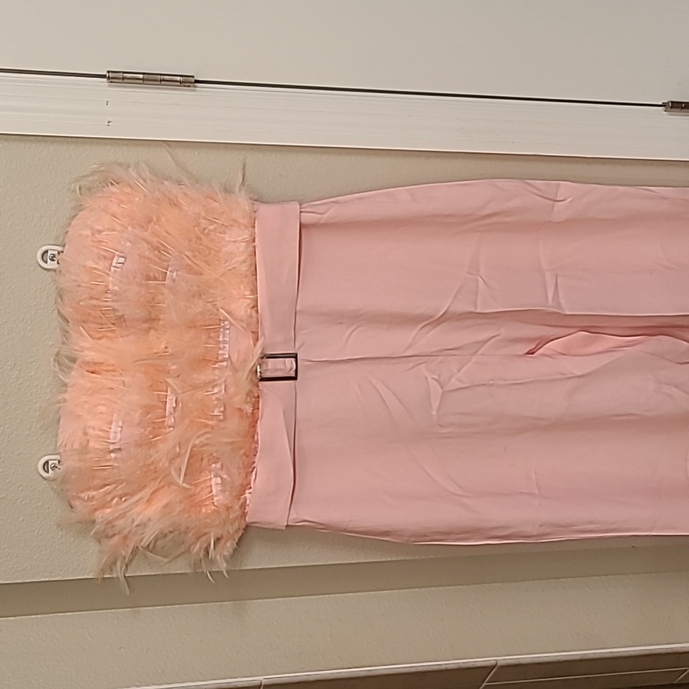 Pink feathered jumpsuit. large